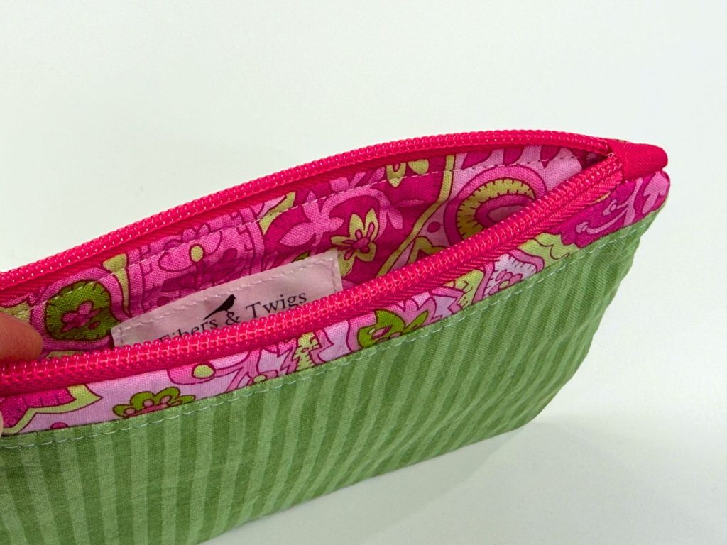 zipper pouch with tabs and zipper trim